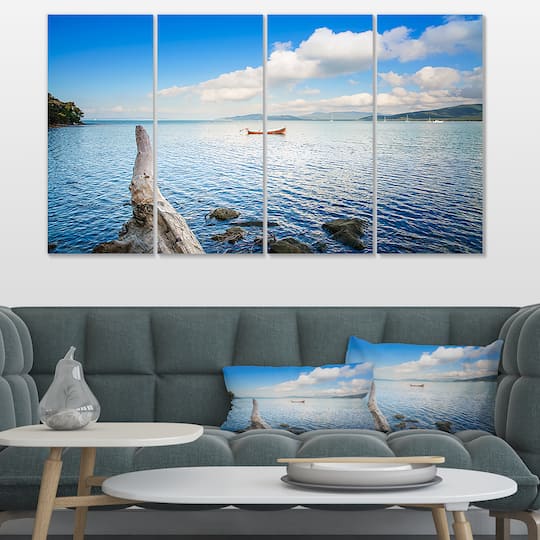Designart - Small Wooden Boat and Tree Trunk